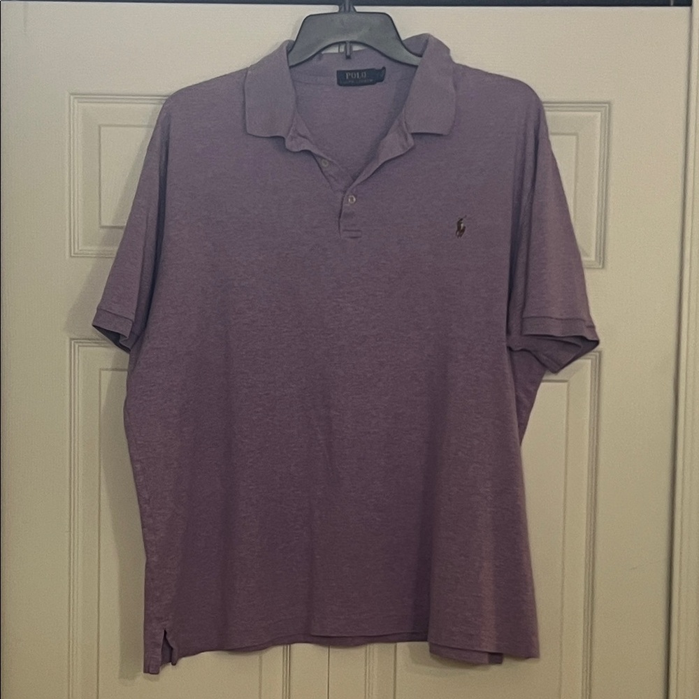 Small tear at the bottom of the shirt. Shows in last picture